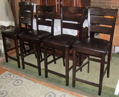 Photo Bar stools set of four dark brown super sturdy near new A $95