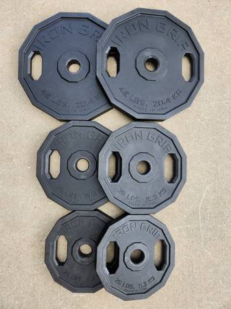 Photo Iron Grip Urethane Encased Olympic Barbell Weight Plates $500