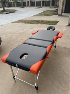 Photo Massage table great condition $165