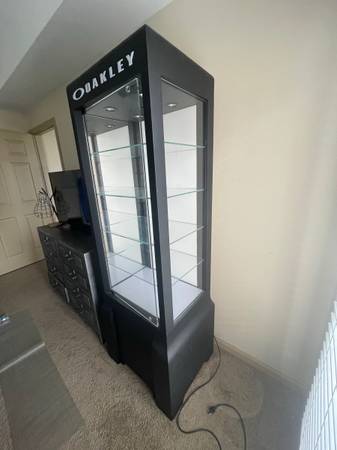 Photo Oakley Display Case w Lights and Lockable Storage. $300