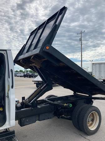 Photo new and used dump trucks flatbeds box trucks $15,999