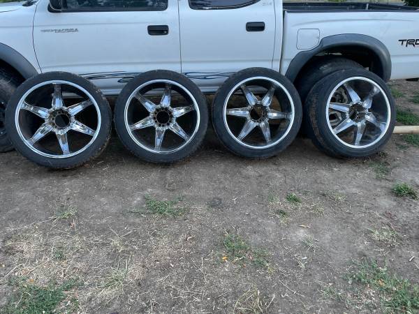 Photo 4x 22 rims with tires - 26540R22 $600
