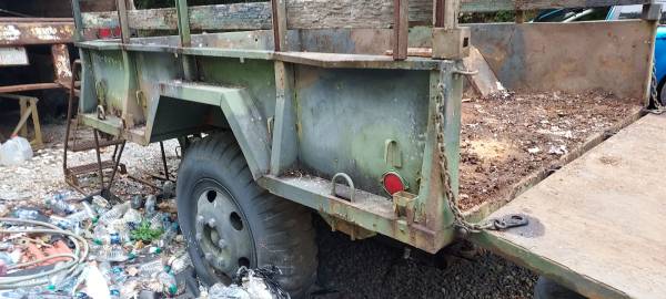 Photo Vintage military trailer with title $800