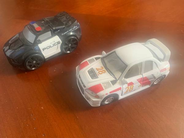 Photo Kintoy Metal Race Car and Police Transformer Car $15
