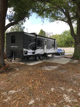 Photo 32 FT travel trailer in 55 community $25,000