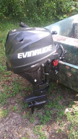 Photo Like new 9.8 Evinrude Boat motor and Camo boat For sale