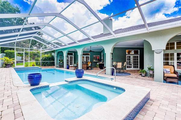 Welcome home to true luxury living with this custom built pool home.