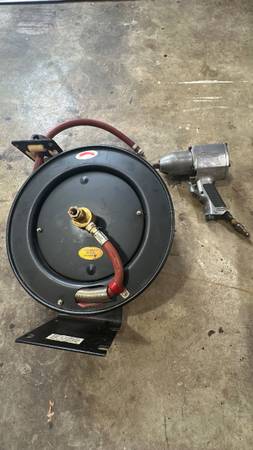 Air Impact Wrench and 25 foot hose on wheel $50