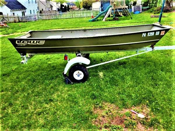 Photo Fishing Boat WTrailerTrolling Motor12 FT Long $1,500