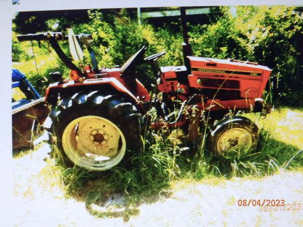Photo IH244 is a 2WD compact utility tractor  Offers Considered $1,500
