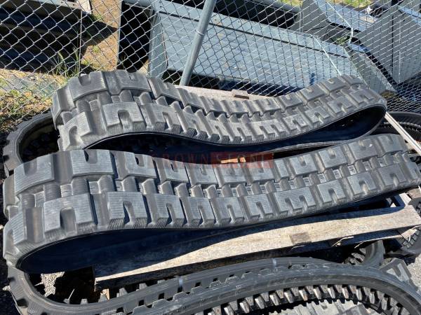 Photo SET OF (2) BOBCAT NARROW RUBBER TRACKS FOR T62, T64  T66 LOADERS $3,000