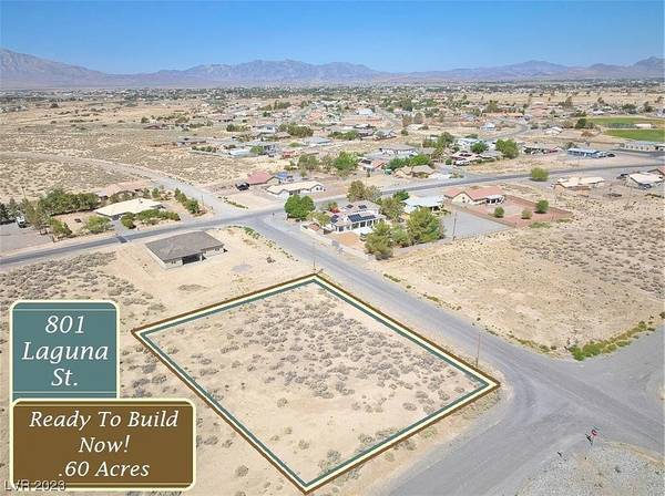 Photo Buildable Land with Water and Power on Extra Large .61 Acre Corner Lot $49,000