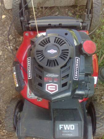 Photo 7.5 horse power Briggs and Stratton self Propelled,walk behind, $175
