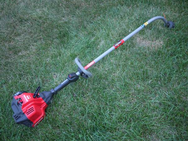 Photo Craftman WC2200 25-cc 2-Cycle 17-in Curved Gas String Trimmer $80