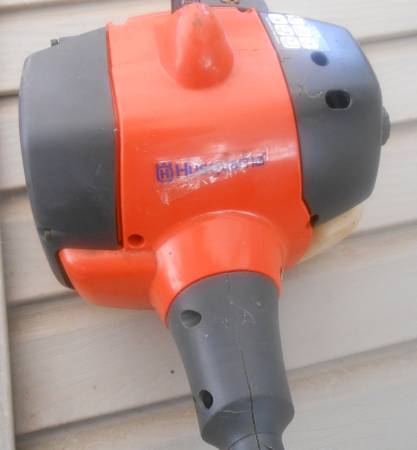 Photo Husqvarna Weed Eater with attachments. $225