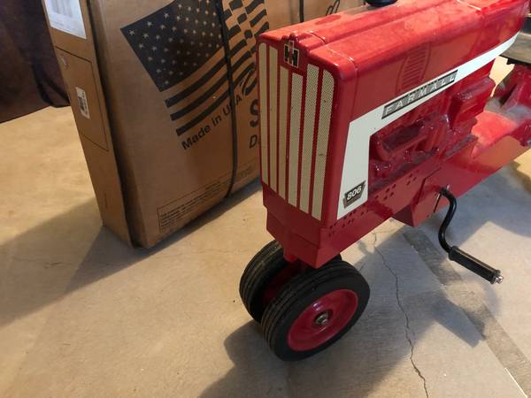 Photo 806 Farmall pedal tractor - new in box $400