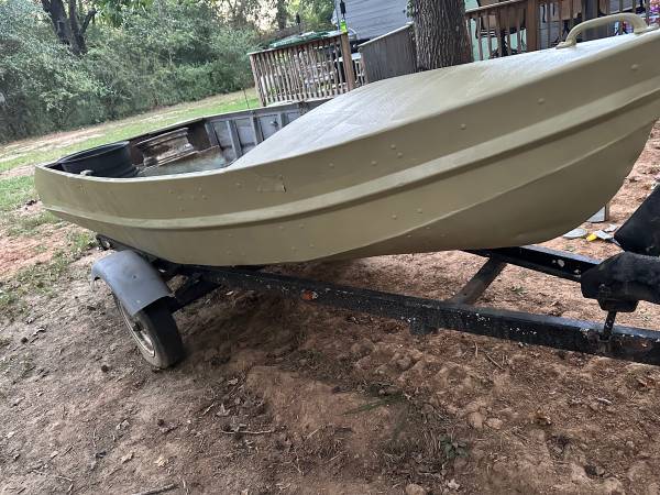 Photo 12 foot V bottom boat and trailer $450