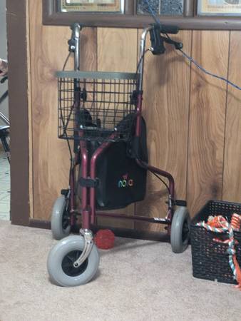 Photo 3 wheel walker $50
