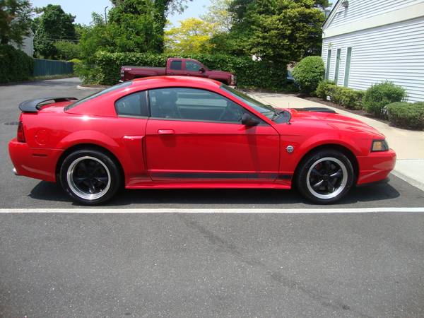 Photo 2004 Mustang Mach 1 5sp 107k leather loaded clean Extras Red Leather $11,900