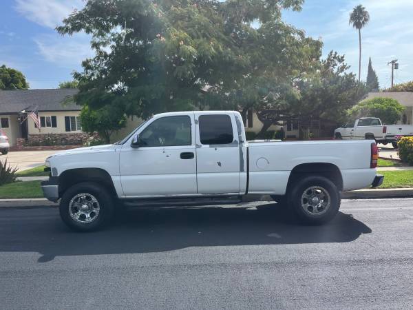 Photo 2002 Chevy Silverado 1500 series extended cab 3 inch lift $3,500