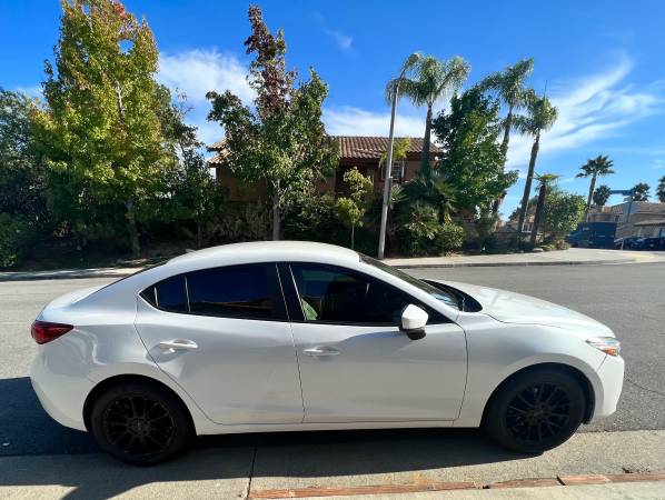 Photo 2017 Mazda 3 Sport 4D Sedan in Pearl White $14,500