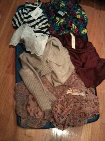 Photo 2 totes full of new with tags shirts and clothes pick price tags Save $125