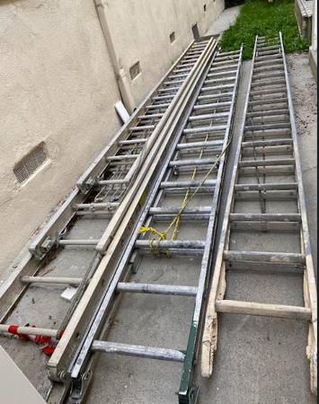 Photo 36-foot Aluminum Industrial extension ladder $150