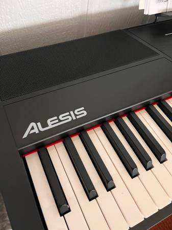 Photo Alesis Recital Pro 88 Key Keyboard  Stand, Yamaha Bench, And Pedal - $325