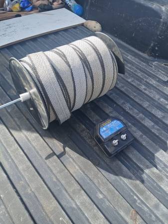 Photo Brand new roll of shock wire and power source $40