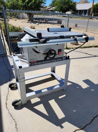 Photo Ryobi BT3000 Sliding Table Saw with Router Table Attachment, Rip and M $140