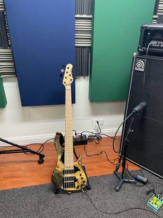 Photo looking to trade my custom 6 string MGBass for a Fender Jazz Bass
