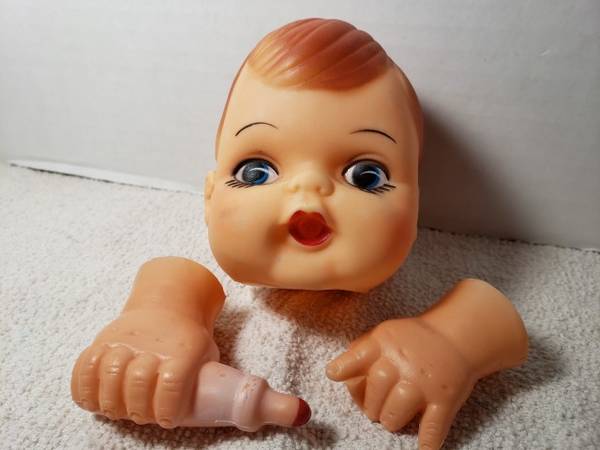 Photo vintage 3.5 doll head- can suck his bottle $5