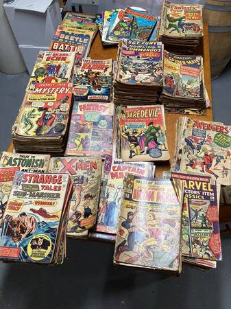Photo Buying comics - a Lynchburg area collector-cash for your comic books