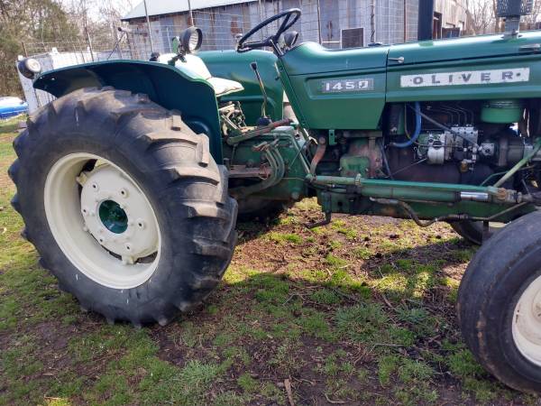 Photo Oliver diesel tractor 6 ft bush hog $5,990
