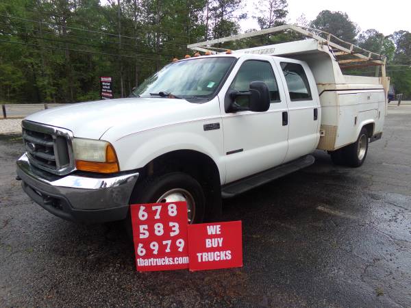 Photo 2000 FORD F450 CREW CAB 7.3 4X4 utilty AND dump bed $8,900