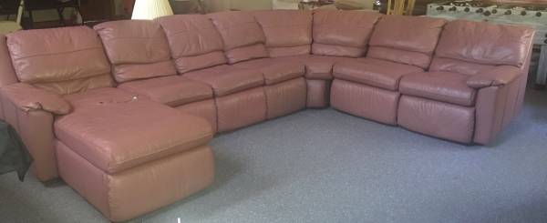 Photo Leather couch with fold out mattress $55