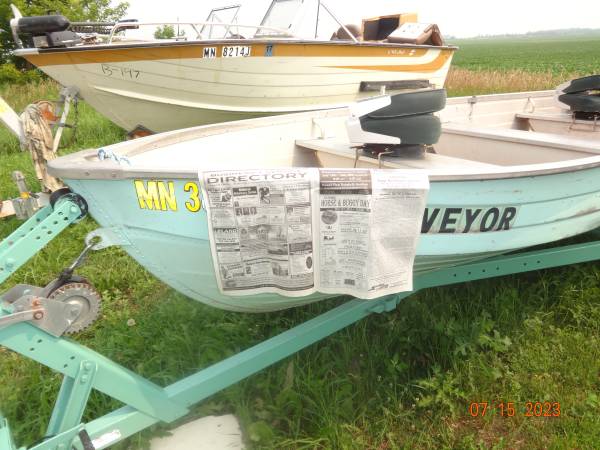Small fishinghunting boat, 9.9 Mariner and trailer $950