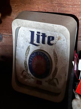 Photo antique miller lite bar sign. $150
