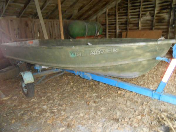 Photo duck boat 12 foot and trailer $350