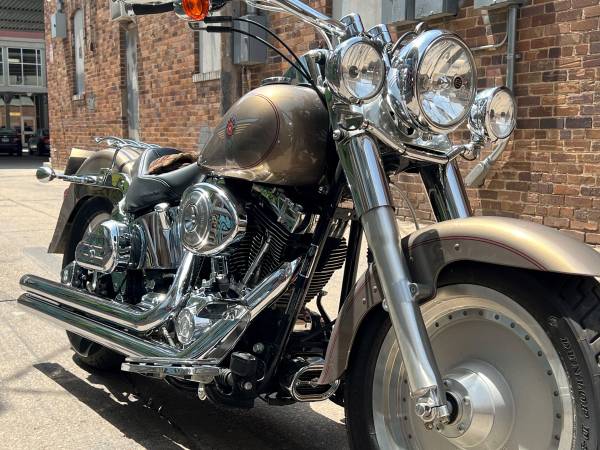 Photo Pristine Fat Boy chromed out with super low miles $8,500