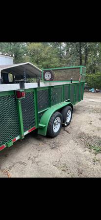 Photo 16 ft lawn trailer w equipment cage $3,500