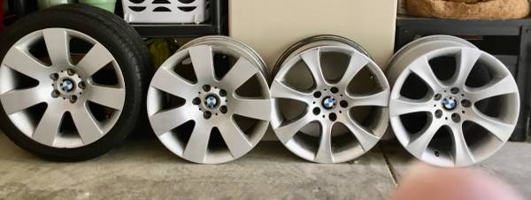 Photo Four BMW cast wheels $75 for all $75