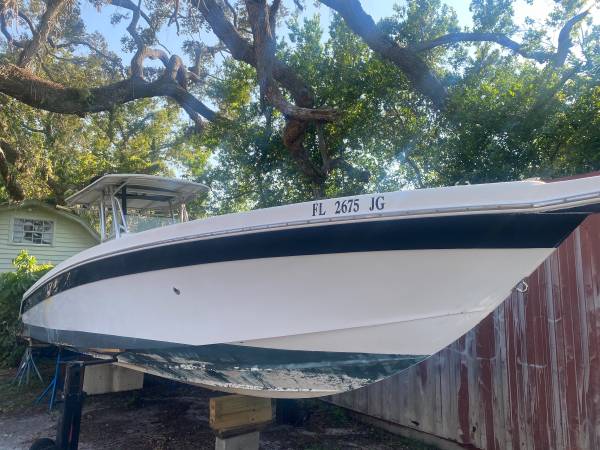 Photo 36 Offshore Performance Center Console  Damaged Hull  $19,500