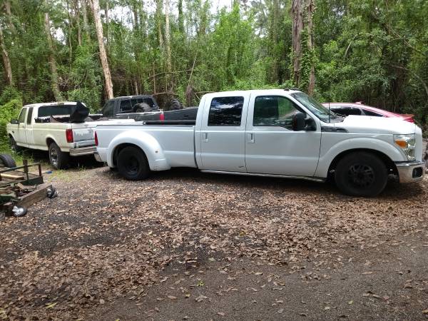 Photo Ford dually, Chevy and Ford trucks $1,500