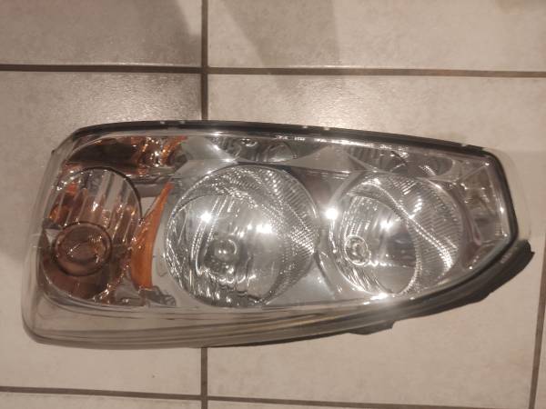Photo Left Headlight for Chevrolet Malibu 2004-2007 $40