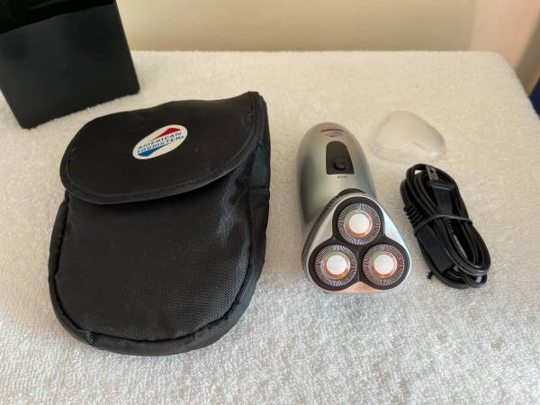 Photo (New) American Tourister Electric Shaver and Travel Case $15