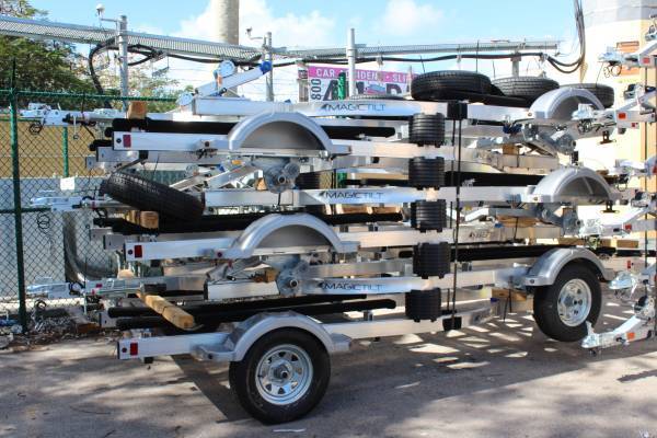 New Magic Tilt double aluminum jet ski trailer, LED lights $2,695