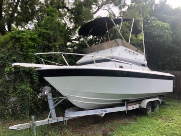 Photo Slick Craft with trailer $1,000