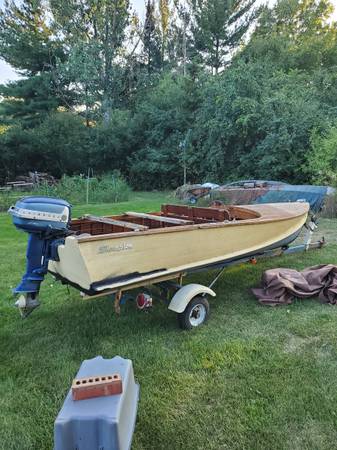 15 Thompson wood boat $500