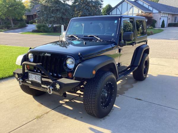 Photo 2013 Jeep Wrangler Sport with replacement engine $17,500